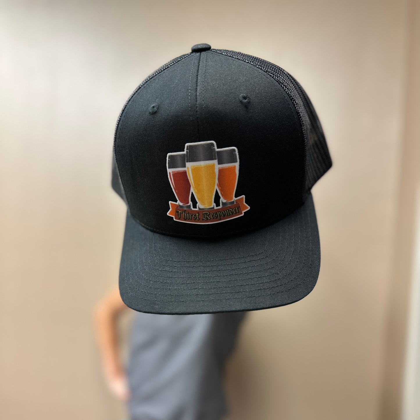 Thirst Responder model showing off the front of the hat
